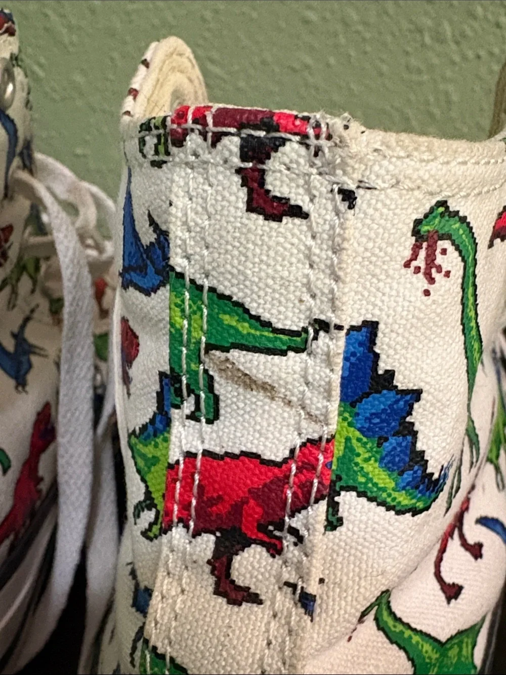 Converse Kids White High-Top Sneakers with Red, Green and Blue Dinosaur Print